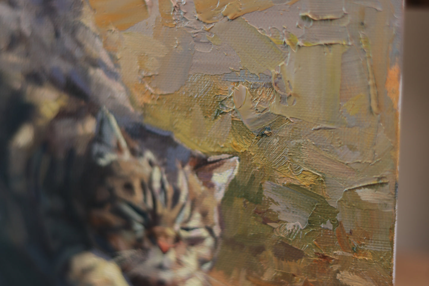 Oil painting of a tabby cat stretching in warm sunlight, with eyes closed and front paws extended. The artwork features expressive brushstrokes and rich textures in tones of gold, brown, and ochre. Canvas size is 6x6 inches.